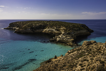 Fototapeta na wymiar The Rabbit beach in Lampedusa, Pelagie islands is a wild beach, protected by WWF , for being home of the extinct loggerhead turtles, who lay theirs eggs in the area, 