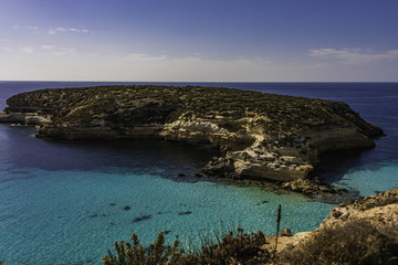 The Rabbit beach in Lampedusa, Pelagie islands is a wild beach, protected by WWF , for being home of the extinct loggerhead turtles, who lay theirs eggs in the area, 