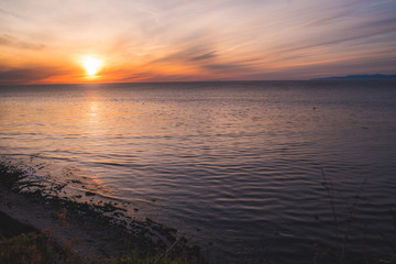 Fototapeta na wymiar Cliffside Sunset at the Sea