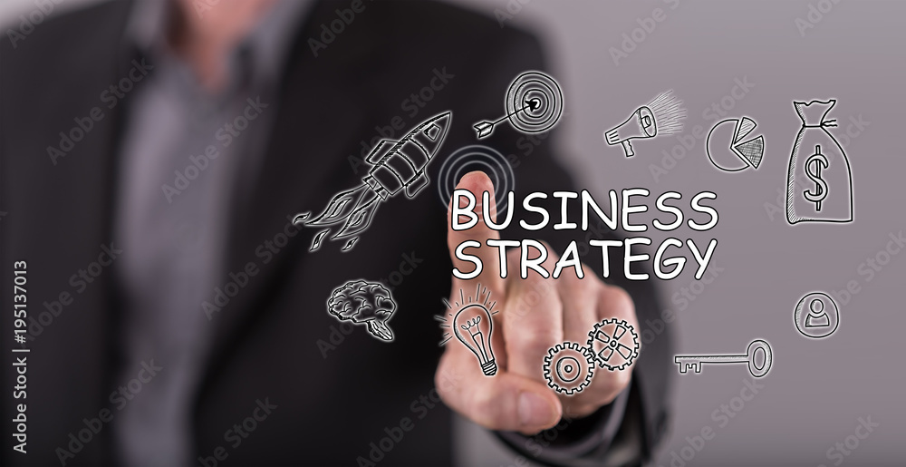 Wall mural man touching a business strategy concept on a touch screen