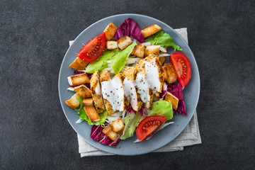 fresh salad with grilled chicken, tomato