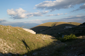 abruzzo countryside, shadow of a man, arms up