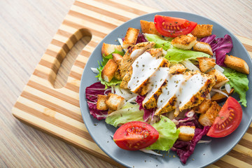 Fresh salad with roast chicken fillet and vegetables