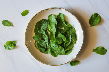Fresh choy sum on marble table