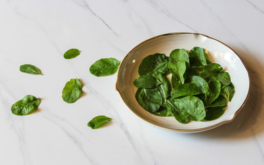 Fresh choy sum on marble table