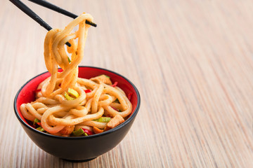 Japanese udon noodles with chopstick