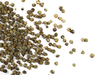 Dry green pepper pile, peppercorn isolated on white, top view
