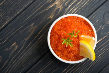Red caviar with slice lemon