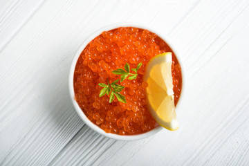 Red caviar with slice lemon