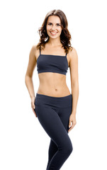 Full body of smiling woman in sportswear, isolated