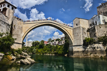 Fototapeta na wymiar MOSATR BOSNIA HERZEGOVINA - AUGUST 15, 2014: popular reconstructed Old Bridge . 15 August 2014 Mostar Bosnia Herzegovina