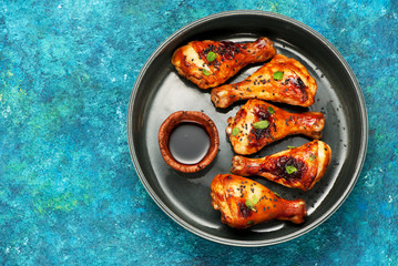 Grilled chicken drumsticks with sesame and soy sauce