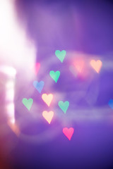 Defocused bokeh light hearts