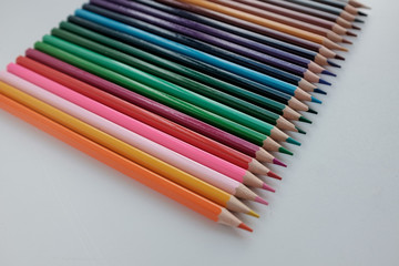 Colour pencils isolated on white background