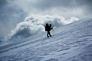 Climber in the snow mountains on the glacier