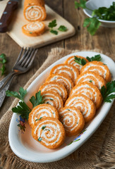 Egg roll with tomato paste, cheese and fresh greens 