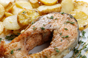 Roasted  salmon with  potatoes.
