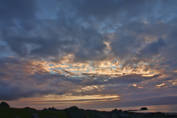 Obraz premium Clouds over the sea in the polar night, Norway