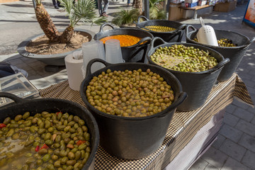 Green olive on the market in the street in town Palamos