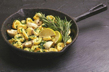 Italian Gnocchi with cream sauce, olives and rosemary