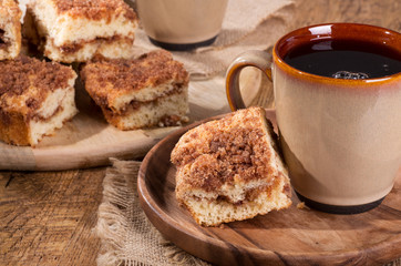 Cinnamon swirl crumb cake and cup of coffee