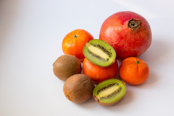 tropical fruits on white table