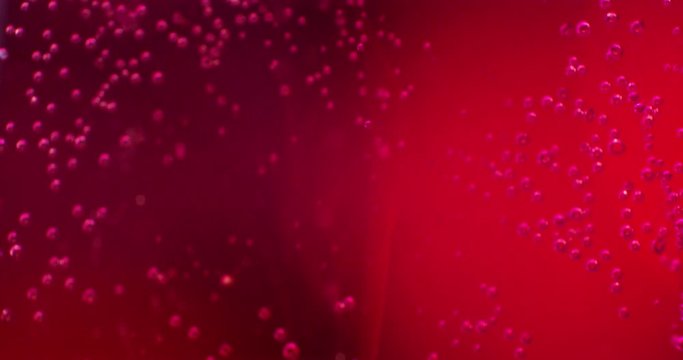 Extreme macro of bubbles in blue jello cream (gel). 4k.

