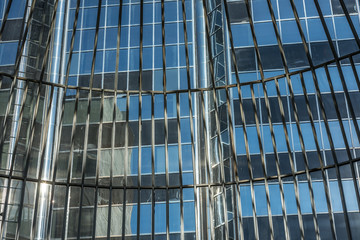 Obraz premium Reflections on glass buildings.