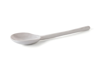 modern ceramic spoon (beautiful shape) on white background