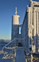 Frozen weather station at the top of the mountain