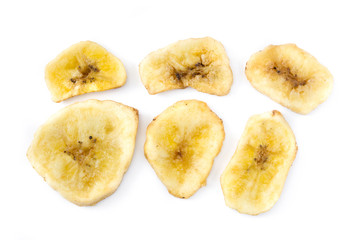 Close up banana chips isolated on white background. Top view