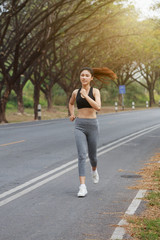 fitness woman running in the park