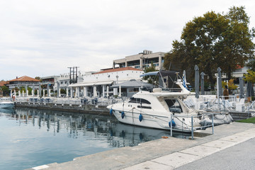 Harbor with Boat and Cafe