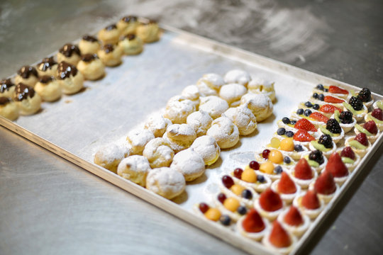 Baking tin with pastries on it