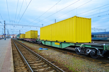 Transportation of cargoes by rail in containers. Railway infrastructure background