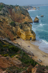 Tiny sandy Praia do Camilo beach near Lagos, Portugal.