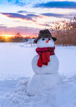 classic snowman on sunset