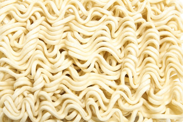 Raw asian ramen instant noodle uncooked isolated on white background