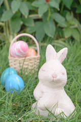 Happy Easter. Cute Easter bunny with colorful eggs