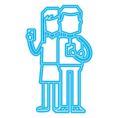 woman and man holding smartphone