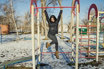 A girl is having some fun in the park