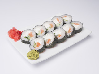 Salmon and caviar rolls on white background