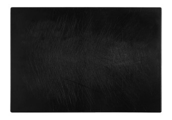 black and scratched chopping board, top view of the object on white background