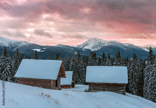 Landscape With Cabins In Winter Mountains Stock Photo And Royalty
