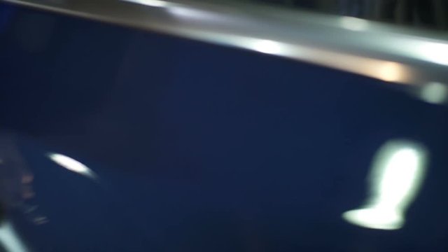 The man opens the door of car