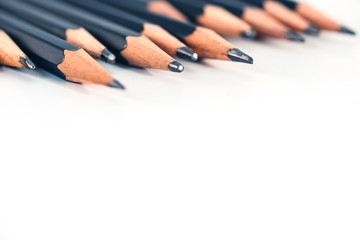 black pencils isolated on white background.Close up.