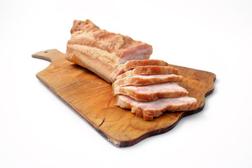 bacon sliced on white background. pork fat with veins.