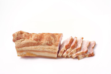 bacon sliced on white background. pork fat with veins.