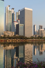 Fototapeta na wymiar Beautiful cityscape - modern buildings near the Benjakitti Park in Bangkok.
