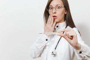 Naklejka premium Close up shocked doctor woman in medical gown with stethoscope, glasses. Focus on clinical thermometer with high fever temperature isolated on white background. Healthcare personnel, medicine concept.